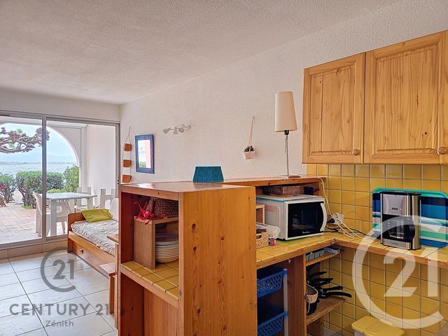 Afficher la photo en grand Appartement F2 bis à vendre - 2 pièces - 33.0 m2 - LE BARCARES - 66 - LANGUEDOC-ROUSSILLON - Century 21 Côte Catalane Immobilier